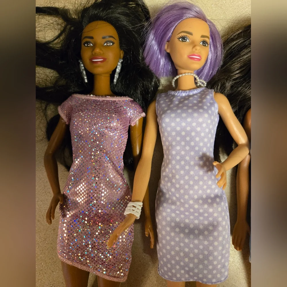 Bundle Of 4 Barbie Dolls